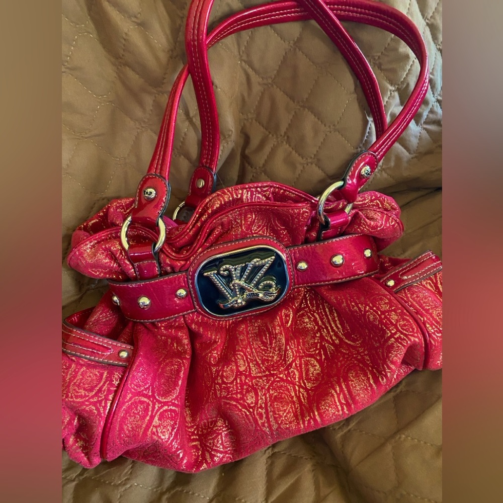 Kathy Van Zeeland shoulder bag. New w/o tags. Never used. Pink/Silver/Black/Gold